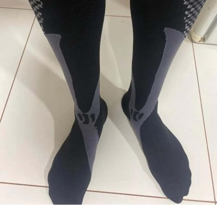 Customer wearing My Vital Flows compression socks